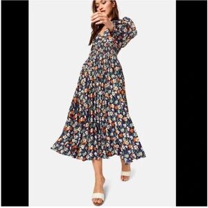Traffic People Floral Smocked A-line Maxi/Midi Dress
Blue and Orange Floral